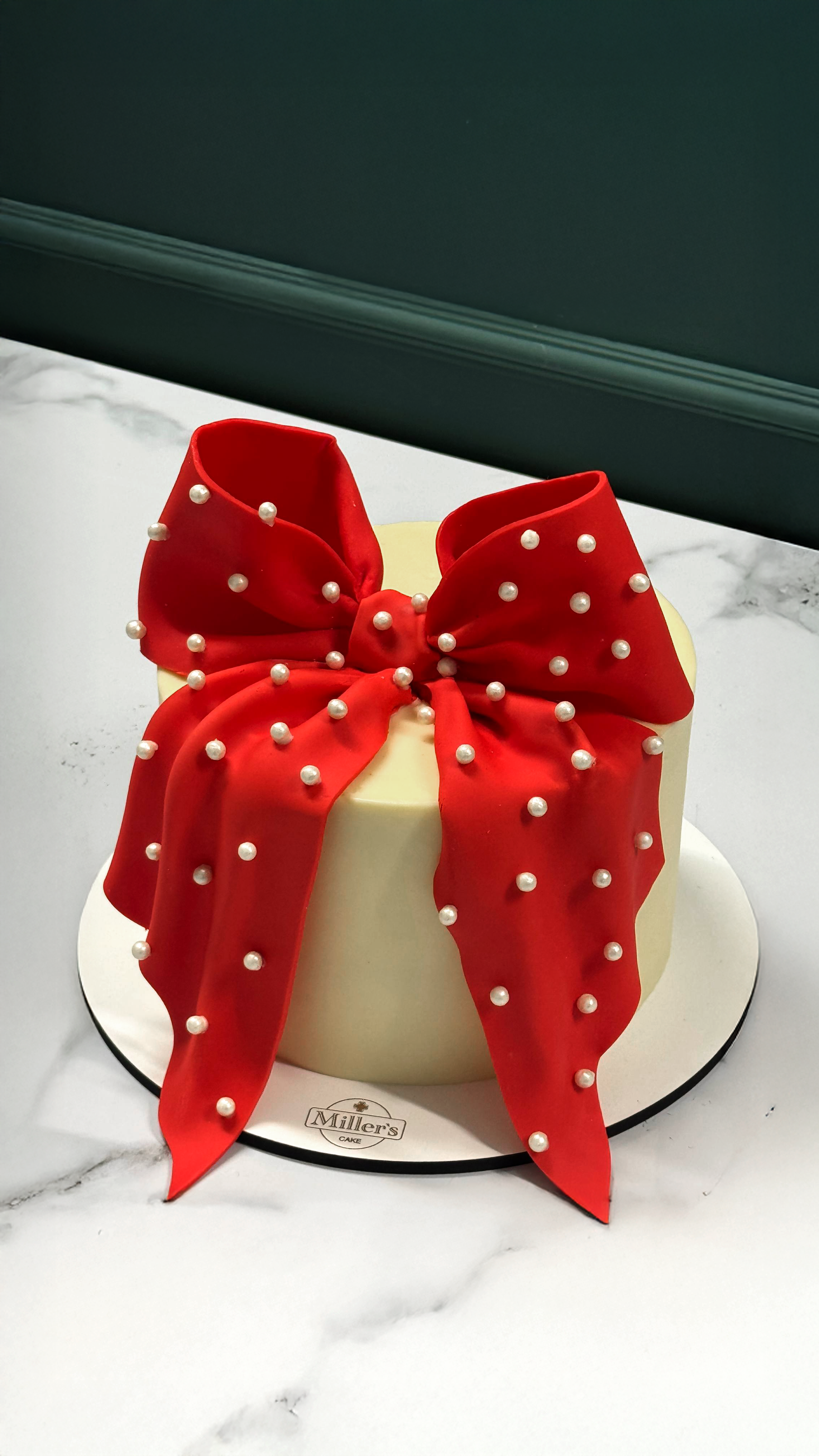 Chic Red Ribbon Celebration Cake