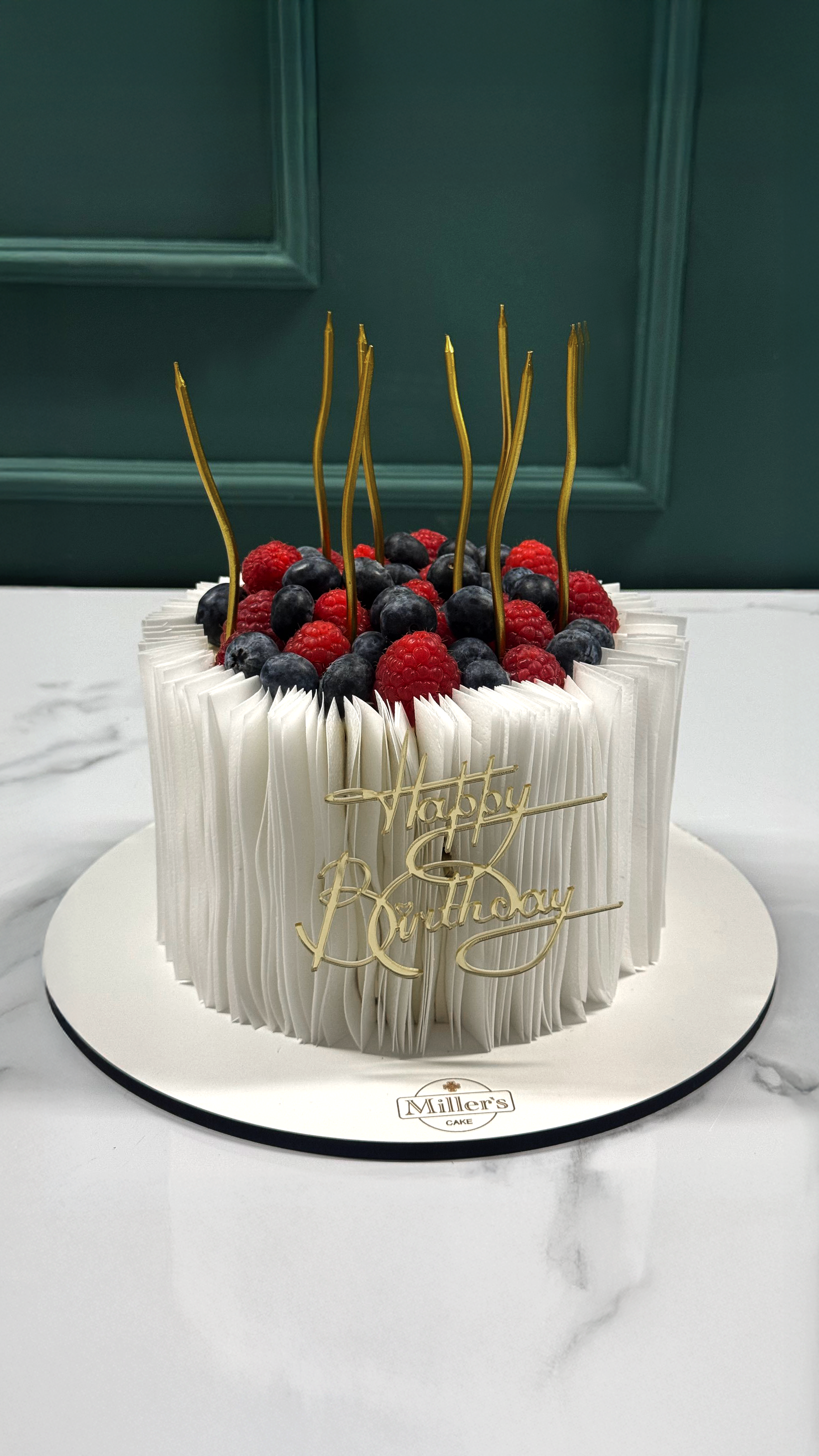 Elegant Berry Ruffle Cake with Gold Details