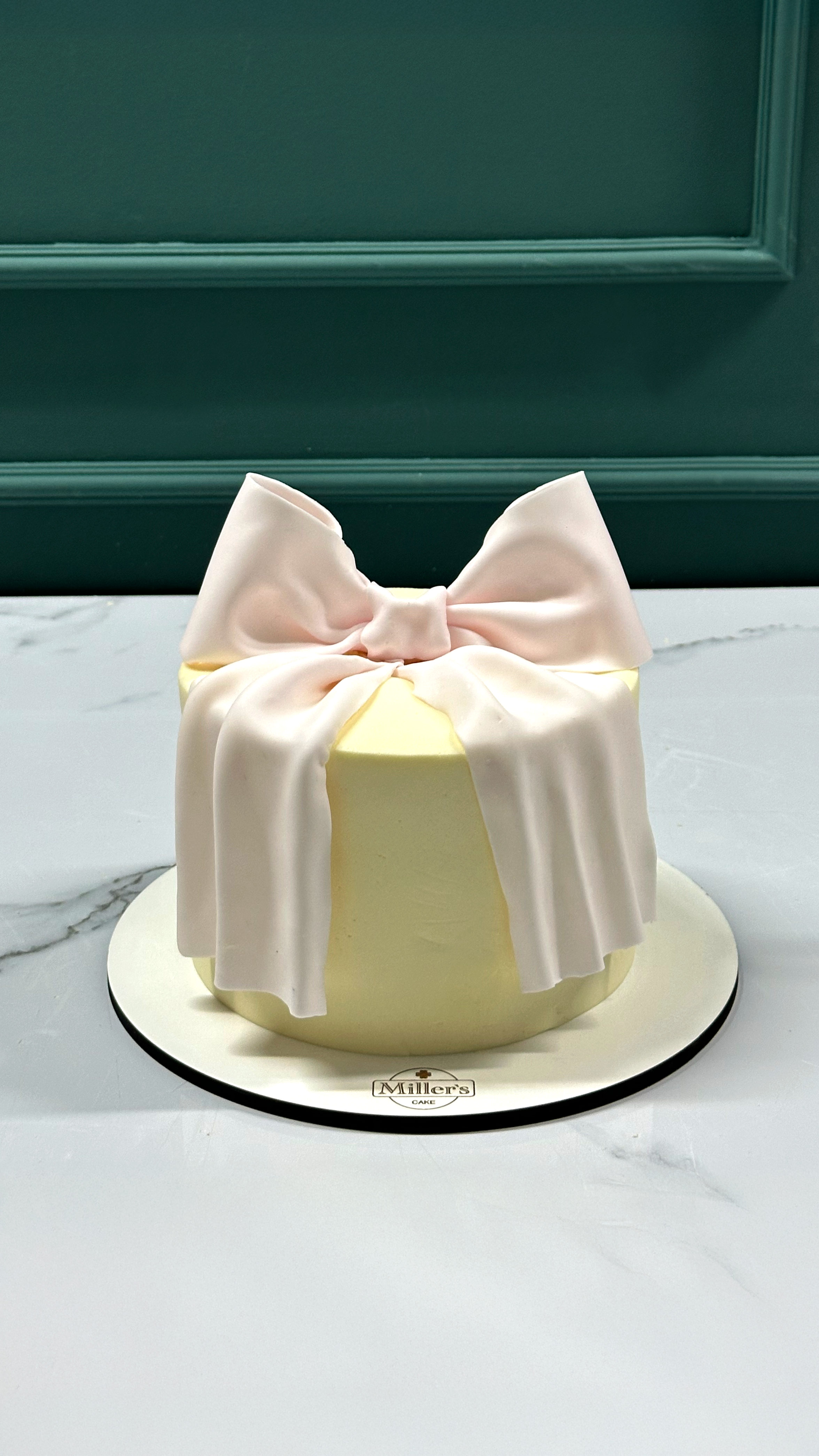 Chic Bow Cake — Soft & Elegant