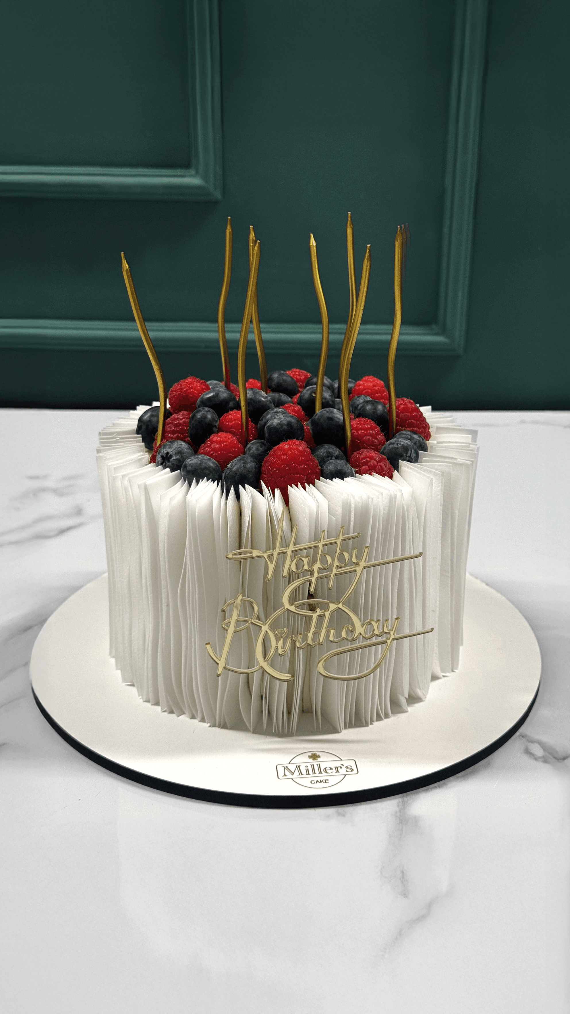Elegant Berry Ruffle Cake with Gold Details