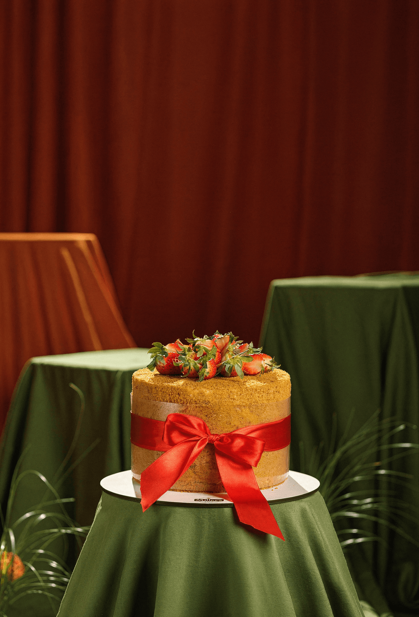 Strawberry Celebration Cake with a Red Ribbon